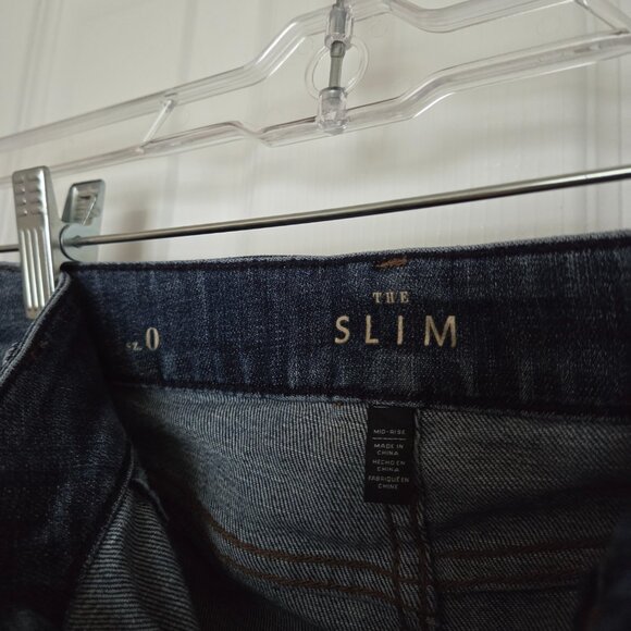 WHBM The Slim Distressed Jeans with deconstructed ankle hem.  Size 0 - Picture 5 of 5